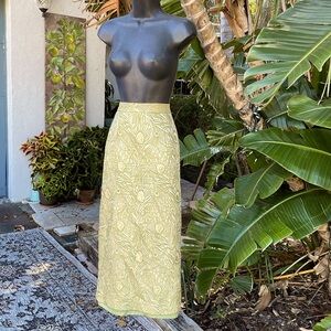 Metallic gold brocade peacock, feather pencil skirt by Nina Messini.